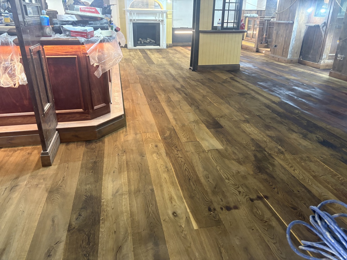 A white oak floor with antique lye to give floor an aged effect